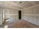 Large living room with natural light and doorway at 1936 King Mill Rd, Mcdonough, GA 30252