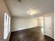 Bright living room featuring wood floors, a neutral color palette, and lots of natural light at 3879 Mcgill Ln, Decatur, GA 30034