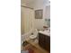 A functional bathroom with a toilet, shower, tub, and sink in need of remodeling at 6880 Mountain Cir, Riverdale, GA 30274