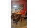 Cozy dining room with a classic round table and comfortable seating at 6880 Mountain Cir, Riverdale, GA 30274