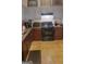 Functional kitchen featuring essential appliances and ample countertop space at 6880 Mountain Cir, Riverdale, GA 30274