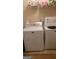 Convenient laundry room with a modern washer and dryer set at 6880 Mountain Cir, Riverdale, GA 30274