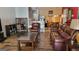 Inviting living room featuring a classic leather sofa and a cozy atmosphere at 6880 Mountain Cir, Riverdale, GA 30274