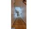 Carpeted stairs leading down to the basement with boxes in the background at 6880 Mountain Cir, Riverdale, GA 30274
