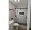 Contemporary bathroom showcasing a glass-enclosed shower with stylish fixtures at 175 Forest Lake Dr, Fayetteville, GA 30215