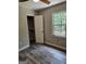 Bedroom with a closet and a window view at 175 Forest Lake Dr, Fayetteville, GA 30215