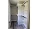 Walk-in closet with custom shelving and black hardware at 175 Forest Lake Dr, Fayetteville, GA 30215
