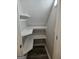 Walk-in closet with custom shelving and hardwood floors at 175 Forest Lake Dr, Fayetteville, GA 30215