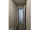 Hallway leading to bedroom with a view from window at 175 Forest Lake Dr, Fayetteville, GA 30215