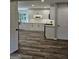 A modern kitchen with white cabinets and stainless steel appliances at 175 Forest Lake Dr, Fayetteville, GA 30215