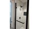 Modern shower features black trim and marble tile walls at 175 Forest Lake Dr, Fayetteville, GA 30215