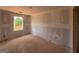 Unfinished bedroom features a window and closet space waiting for personalization at 1926 King Mill Rd, Mcdonough, GA 30252