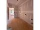 Incomplete laundry room with rough-ins ready for appliances and finishing touches at 1926 King Mill Rd, Mcdonough, GA 30252
