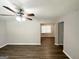 Open living room features sleek hardwood floors, ceiling fan, and plenty of natural light at 2651 Lois Se Ln, Atlanta, GA 30315