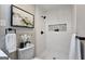 Stylish bathroom with a modern shower, mosaic accents, and matte black fixtures at 1939 Sandringham Sw Dr, Atlanta, GA 30311