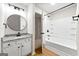 Modern bathroom with granite counters, stylish fixtures and shower-tub combo at 89 Prospect Path, Hiram, GA 30141