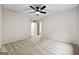 Spacious bedroom with neutral carpet and open doors at 89 Prospect Path, Hiram, GA 30141