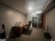 Finished basement with a home office setup including a desk and built-in shelving at 150 Doe Run Ct, Sharpsburg, GA 30277