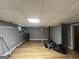 Spacious basement with painted walls and drop ceiling, perfect for recreation or storage at 150 Doe Run Ct, Sharpsburg, GA 30277