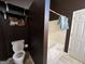 Bathroom features a toilet and shower/tub combo at 150 Doe Run Ct, Sharpsburg, GA 30277