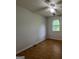 Bedroom with a ceiling fan and wood floors at 150 Doe Run Ct, Sharpsburg, GA 30277