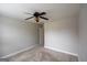 Neutral bedroom with a ceiling fan and carpeted floor at 613 Blackburn Ln, Peachtree City, GA 30269