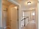 Upstairs hallway showcasing doors to various rooms, offering a glimpse into the home's layout at 613 Blackburn Ln, Peachtree City, GA 30269