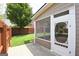 Home exterior with access to the screened porch and a view of the fenced backyard at 613 Blackburn Ln, Peachtree City, GA 30269