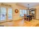 Bright breakfast area includes French doors that provide access to the outdoor space and natural light at 557 Arrowhead Cir, Rutledge, GA 30663