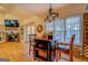 Cozy breakfast nook with backyard views, bathed in natural light and seamlessly connecting indoor and outdoor spaces at 557 Arrowhead Cir, Rutledge, GA 30663