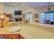 This kitchen offers a breakfast bar, seamless flow into the adjacent Gathering room, and a warm, inviting atmosphere at 557 Arrowhead Cir, Rutledge, GA 30663