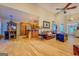 Open-concept living area features hardwood floors, seamless flow into the kitchen, and plenty of space for entertaining at 557 Arrowhead Cir, Rutledge, GA 30663
