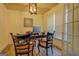 A cozy office space featuring hardwood floors, wood-paneled ceilings, and a built in desk at 557 Arrowhead Cir, Rutledge, GA 30663