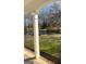 Scenic view of the pond from the home's porch, showcasing the natural beauty of the property at 557 Arrowhead Cir, Rutledge, GA 30663