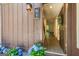 Inviting entrance with decorative door and beautiful landscaping, creating an immediate appeal at 65 Cobblestone Crk, Peachtree City, GA 30269