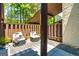 Cozy outdoor patio featuring comfortable seating, perfect for relaxing and entertaining guests at 65 Cobblestone Crk, Peachtree City, GA 30269