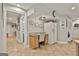 Finished basement with desk area, tile floor, and easy access to the utility area at 106 Hidden Springs Ln, Peachtree City, GA 30269