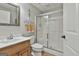 Bathroom with shower, single vanity, and tile flooring at 106 Hidden Springs Ln, Peachtree City, GA 30269