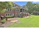 Beautiful brick home with a screened in porch and large backyard at 106 Hidden Springs Ln, Peachtree City, GA 30269
