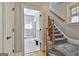 Hallway view to the Laundry Room. Stairway is also visible at 106 Hidden Springs Ln, Peachtree City, GA 30269