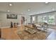 Inviting living room with hardwood floors, comfortable seating, and an open layout at 106 Hidden Springs Ln, Peachtree City, GA 30269