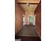 Hallway with multiple doorways and carpet, ready for customization and updates at 585 Huddleston Rd, Fayetteville, GA 30214