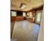 Spacious kitchen with plentiful wood cabinets, ready for customization and updates at 585 Huddleston Rd, Fayetteville, GA 30214