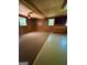 Expansive living room with carpet and two-toned flooring offering great potential for customization at 585 Huddleston Rd, Fayetteville, GA 30214