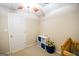 Bedroom featuring a ceiling fan, a storage cube and crib at 155 Cottage Cir, Fayetteville, GA 30215