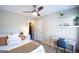 Bright bedroom featuring a bed, desk, and walk-in closet with ample storage at 155 Cottage Cir, Fayetteville, GA 30215