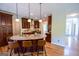 Spacious open concept kitchen with generous seating around the island, seamlessly connecting the living spaces at 155 Cottage Cir, Fayetteville, GA 30215