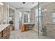 Bathroom featuring a glass enclosed shower, double sinks, and a make up vanity at 500 Cottonwood Cir, Peachtree City, GA 30269