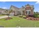 Attractive single Gathering home with vibrant landscaping and a two-car garage at 500 Cottonwood Cir, Peachtree City, GA 30269