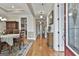 Inviting home entry with hardwood floors, elegant furnishings, and a dining area at 500 Cottonwood Cir, Peachtree City, GA 30269